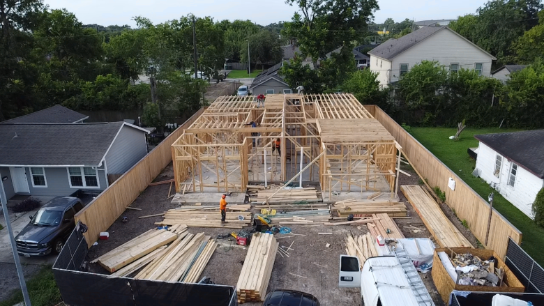 Aerial drone view of a Cross Builds new construction home framing in progress in Houston