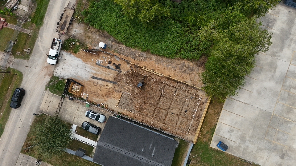 Aerial view of a construction site breaking ground on Boy Street