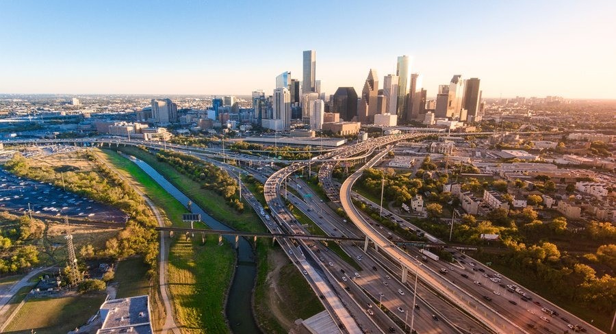 Aerial view of downtown Houston, Texas skyline with highways and Buffalo Bayou
